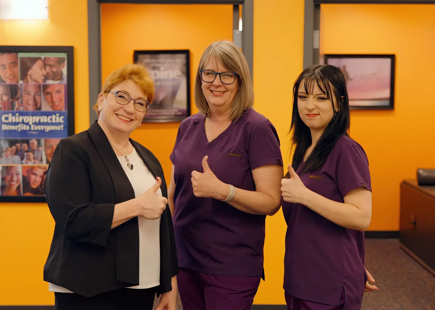 Dr. Trish Wolff and two team members giving thumbs up